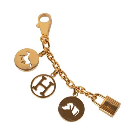 hermes olga bag charm gold|Hermes Gold Breloque Olga Bag Charm .